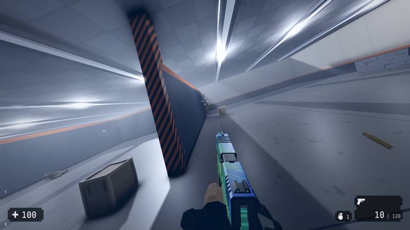 A tilted view past a striped wall, handgun raised and an empty case on the floor