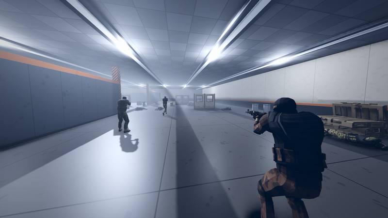 A player kneels with a rifle while teammates run down the lit hall